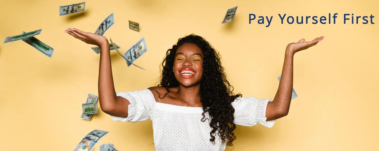 woman throwing money into the air with caption pay yourself first
